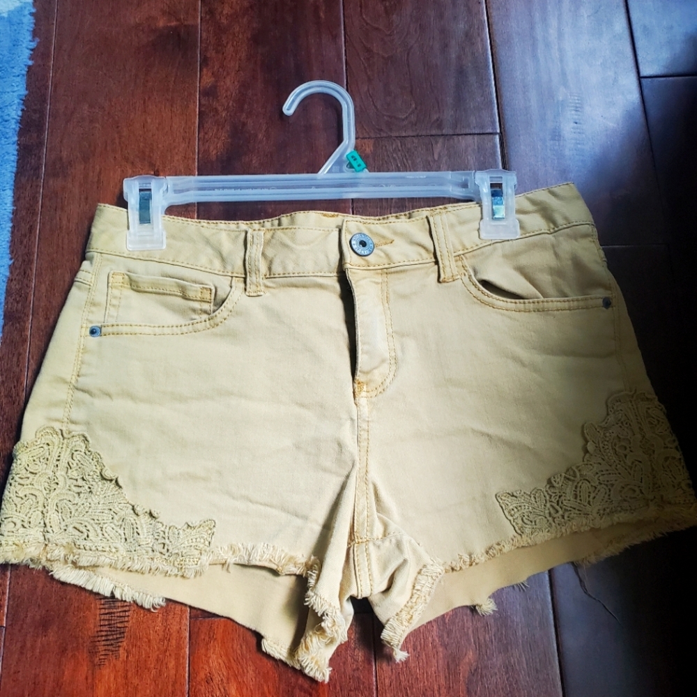 Yellow jean shorts size 9 by vanilla star with details on side